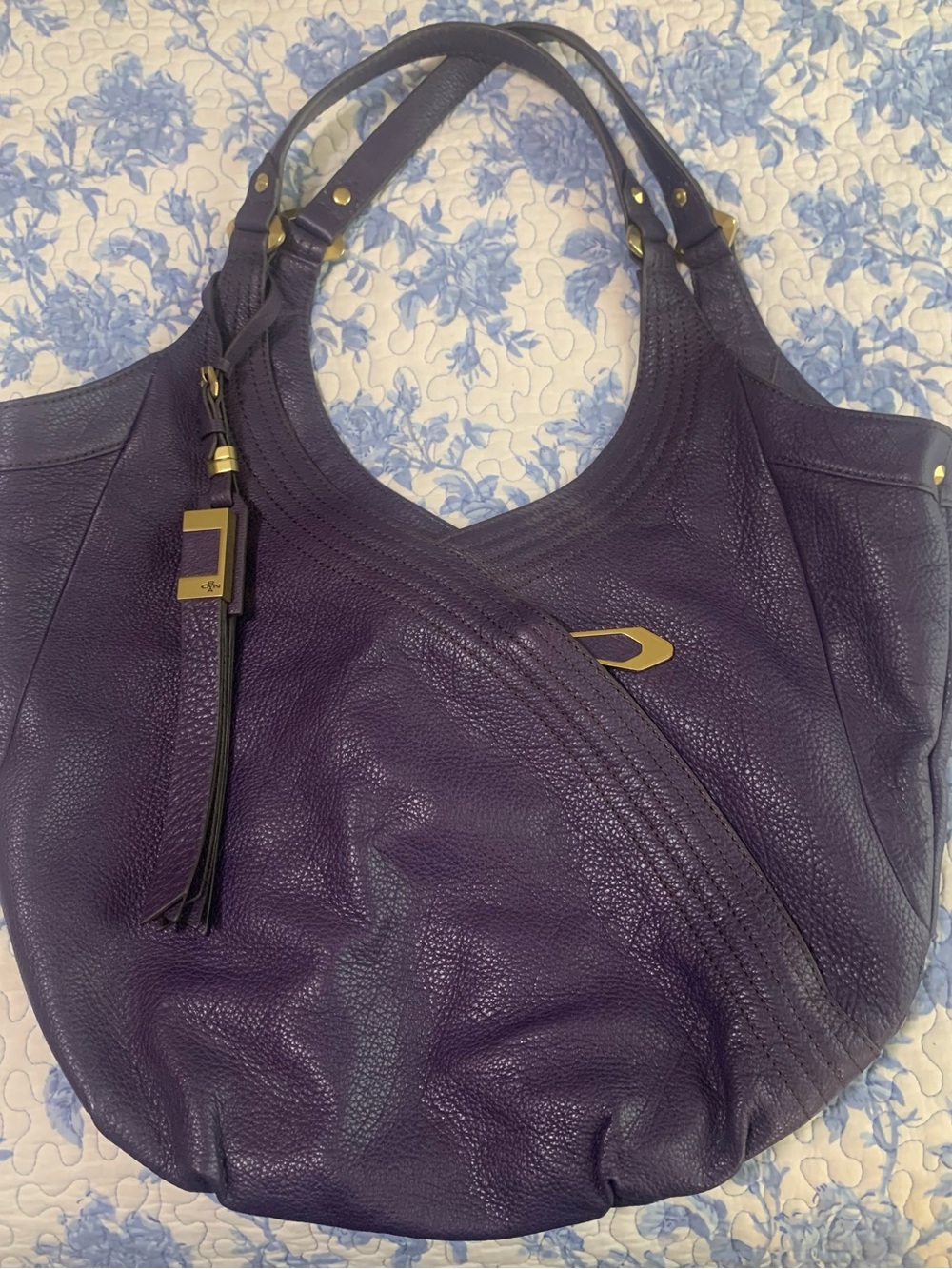 orYANY Purple Pebbled Leather Shoulder Hobo with Tassel